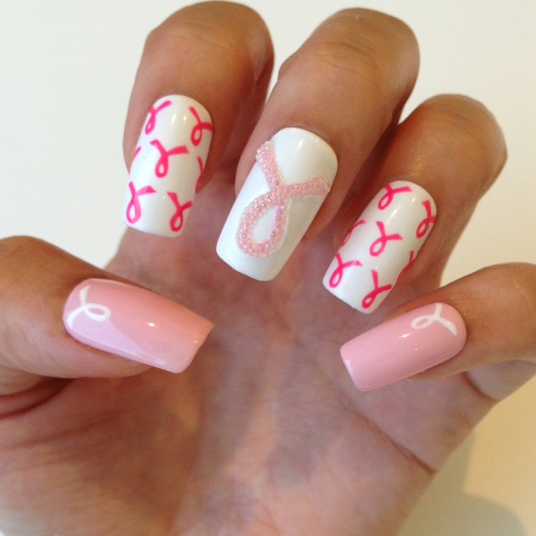 unghie rosa cipria, un'idea di manicure giovane e frizzante con decorazioni a fiocco